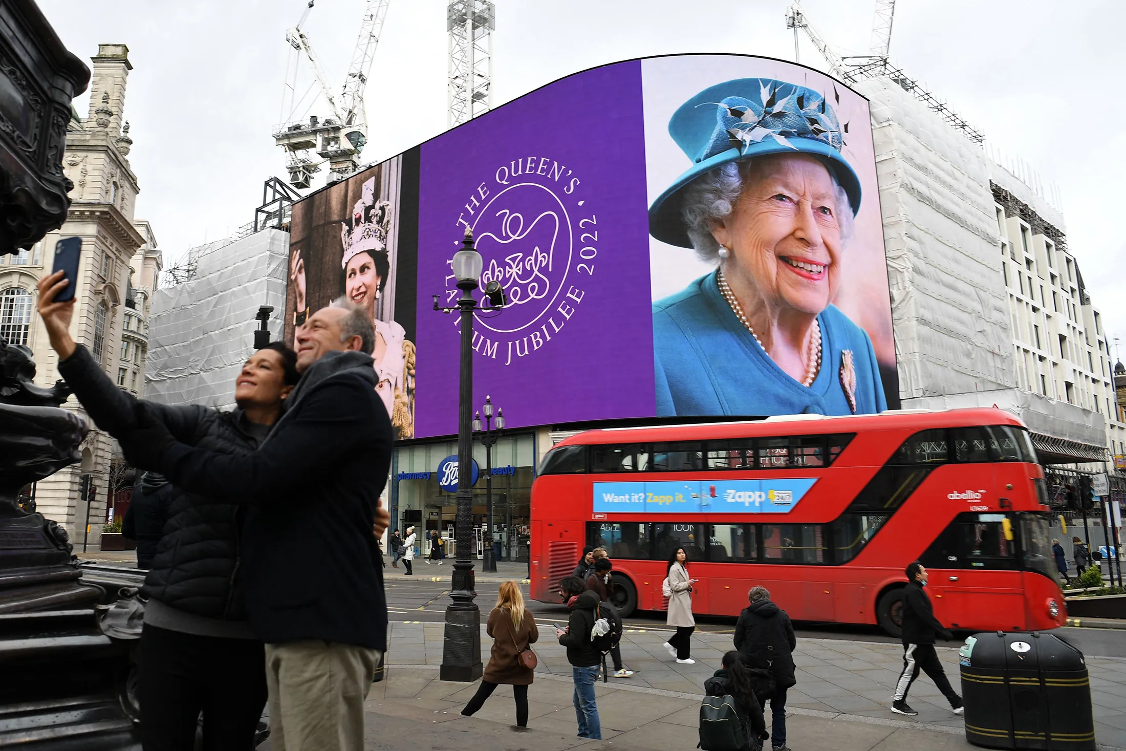 A poster of Britain's Queen Elizabeth II displayed on a digital screen&nbsp;at Piccadilly Circus in central London.
