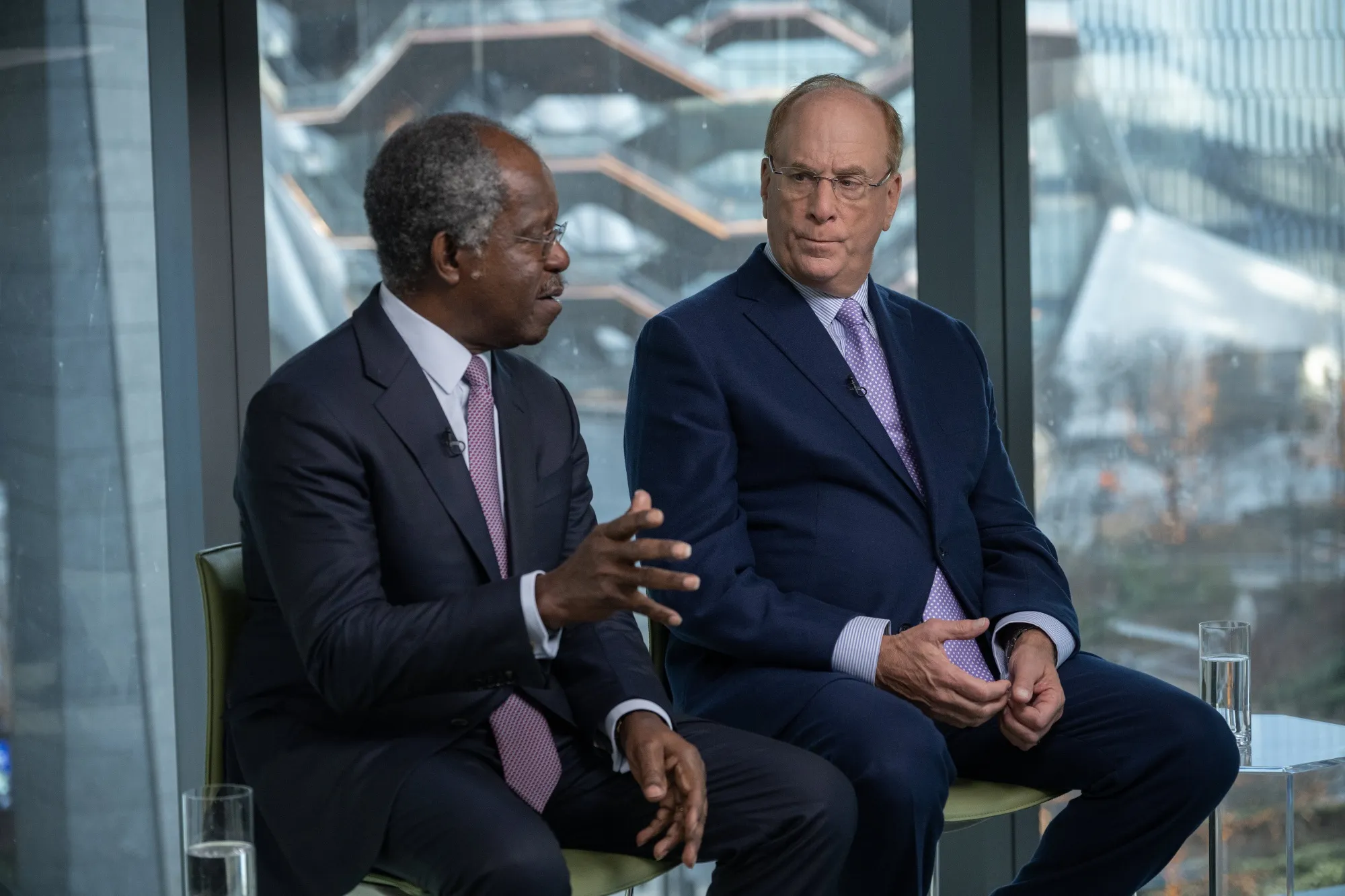 “Bayo” Ogunlesi, left, and Larry Fink