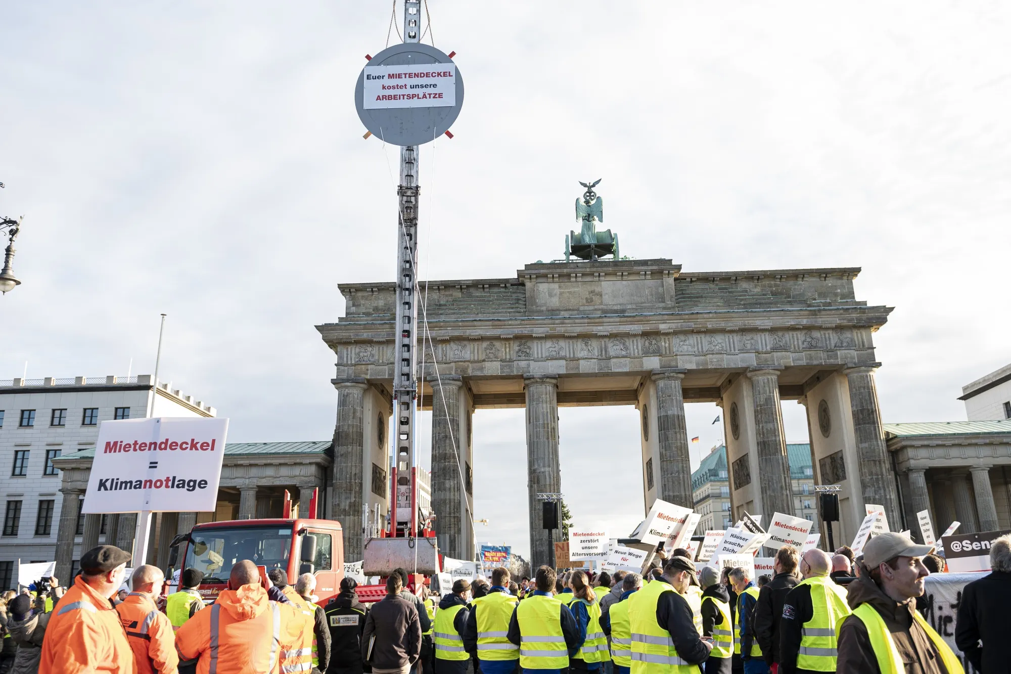 Protesters demonstrate against a plan to freeze rents&nbsp;in front of the Brandenburg Gate in Berlin on Dec. 9.&nbsp;