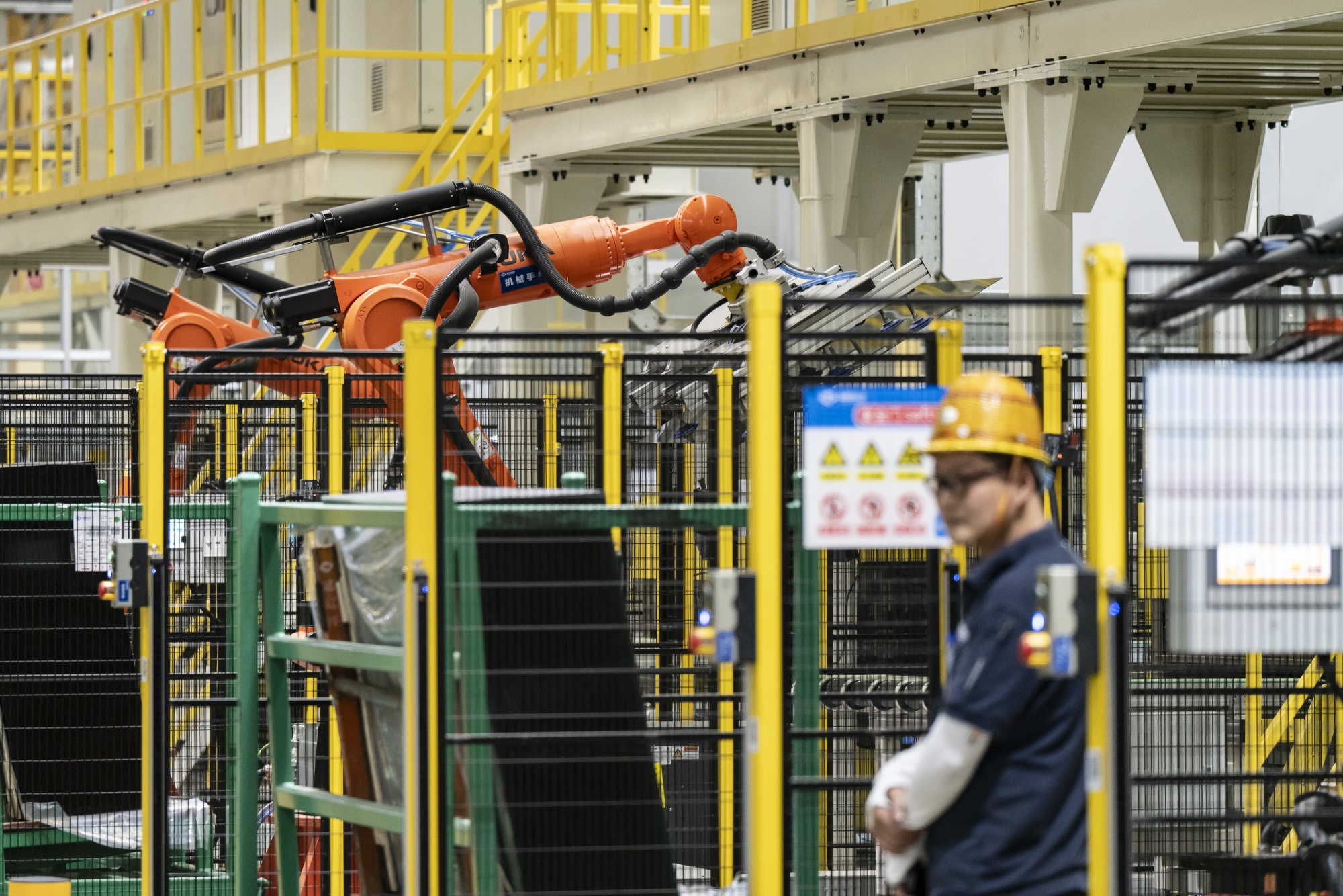 Robotic arms on China's production line.