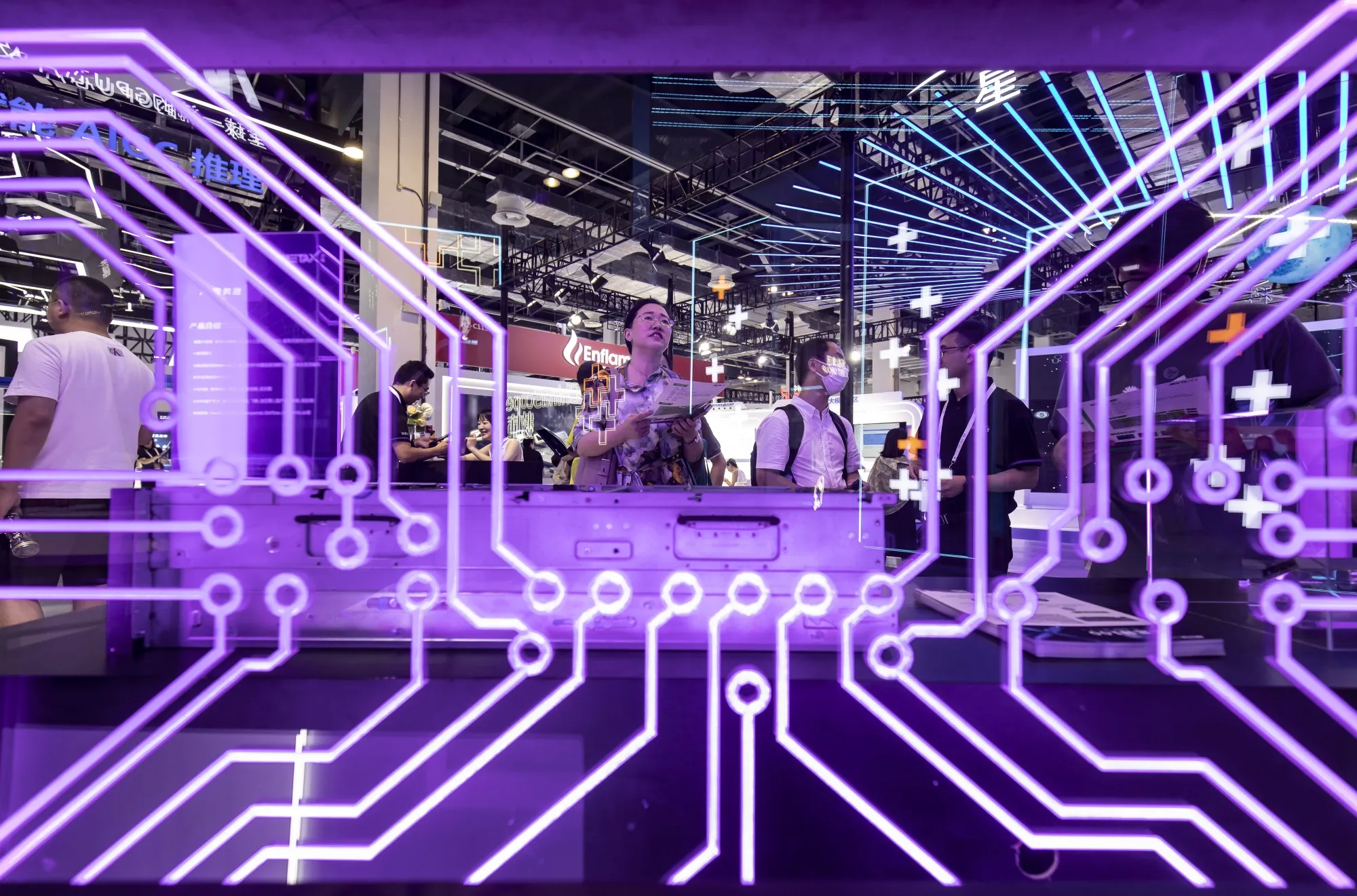 Attendees at the MetaX LLC booth at the World Artificial Intelligence Conference&nbsp;in Shanghai in 2023.