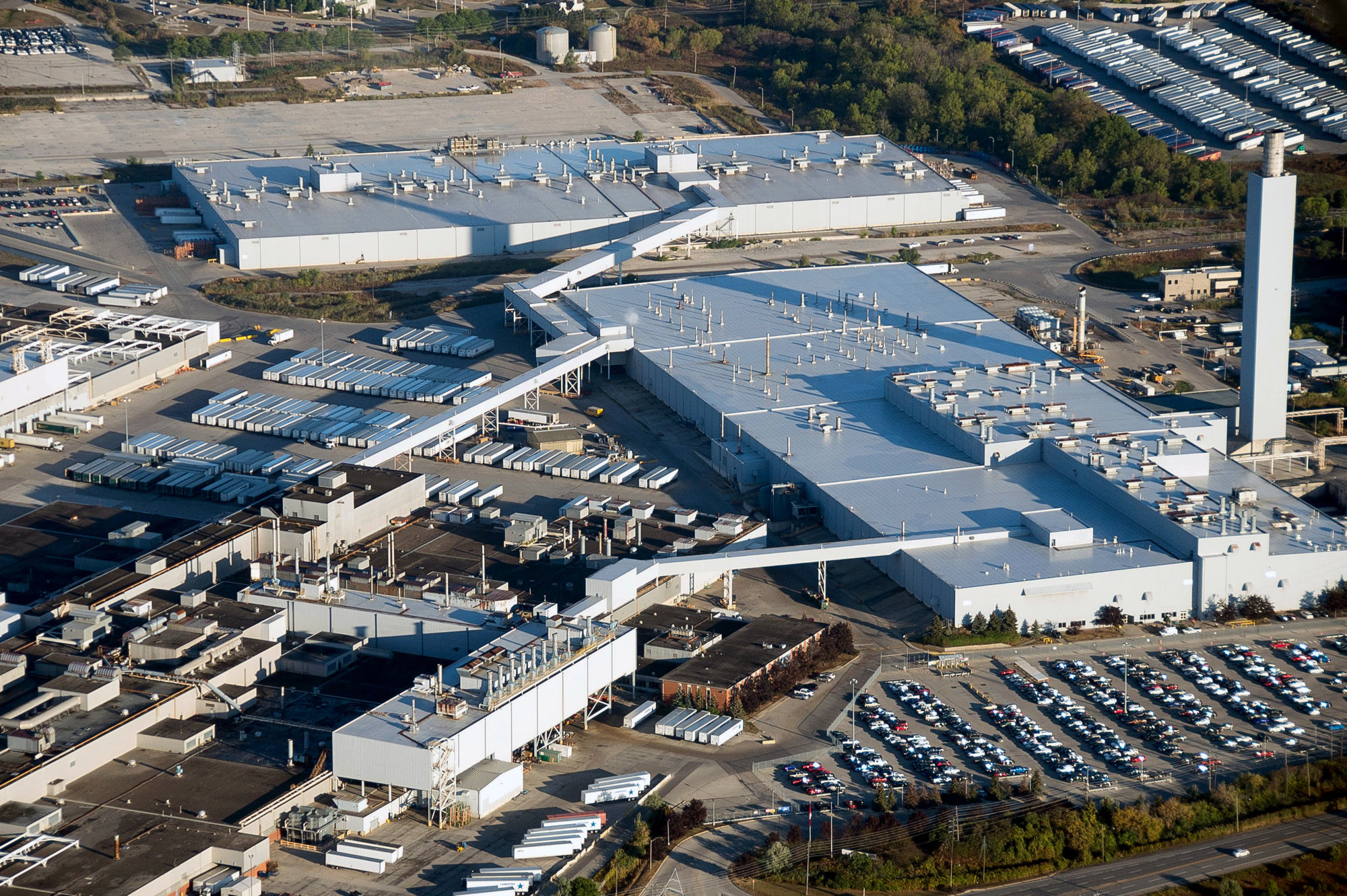 Vehicles sit at the Ford Motor Co. plant in this aerial photograph taken above Oakville, Ontario, Canada
