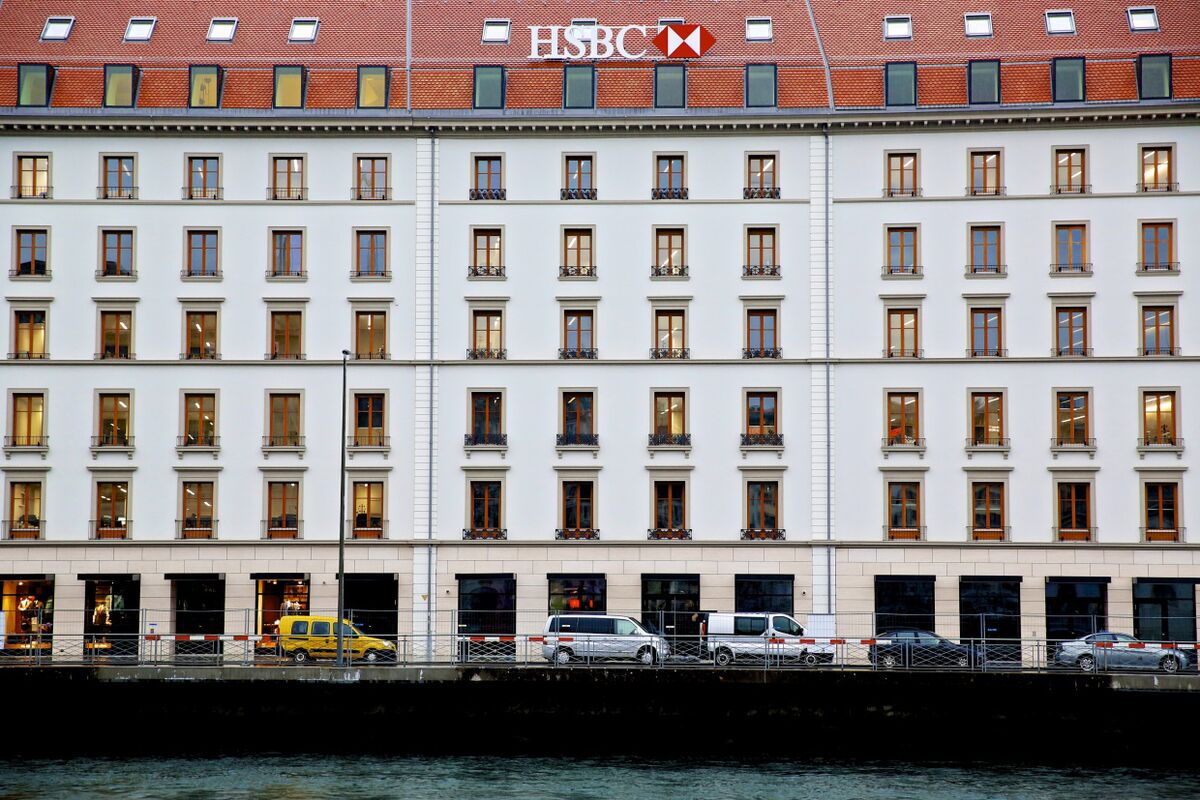 An HSBC logo sits on the building that houses HSBC Holdings Plc's private banking unit in Geneva.