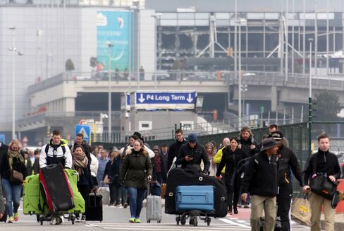 Passengers are evacuated from Brussels airport on March 22.