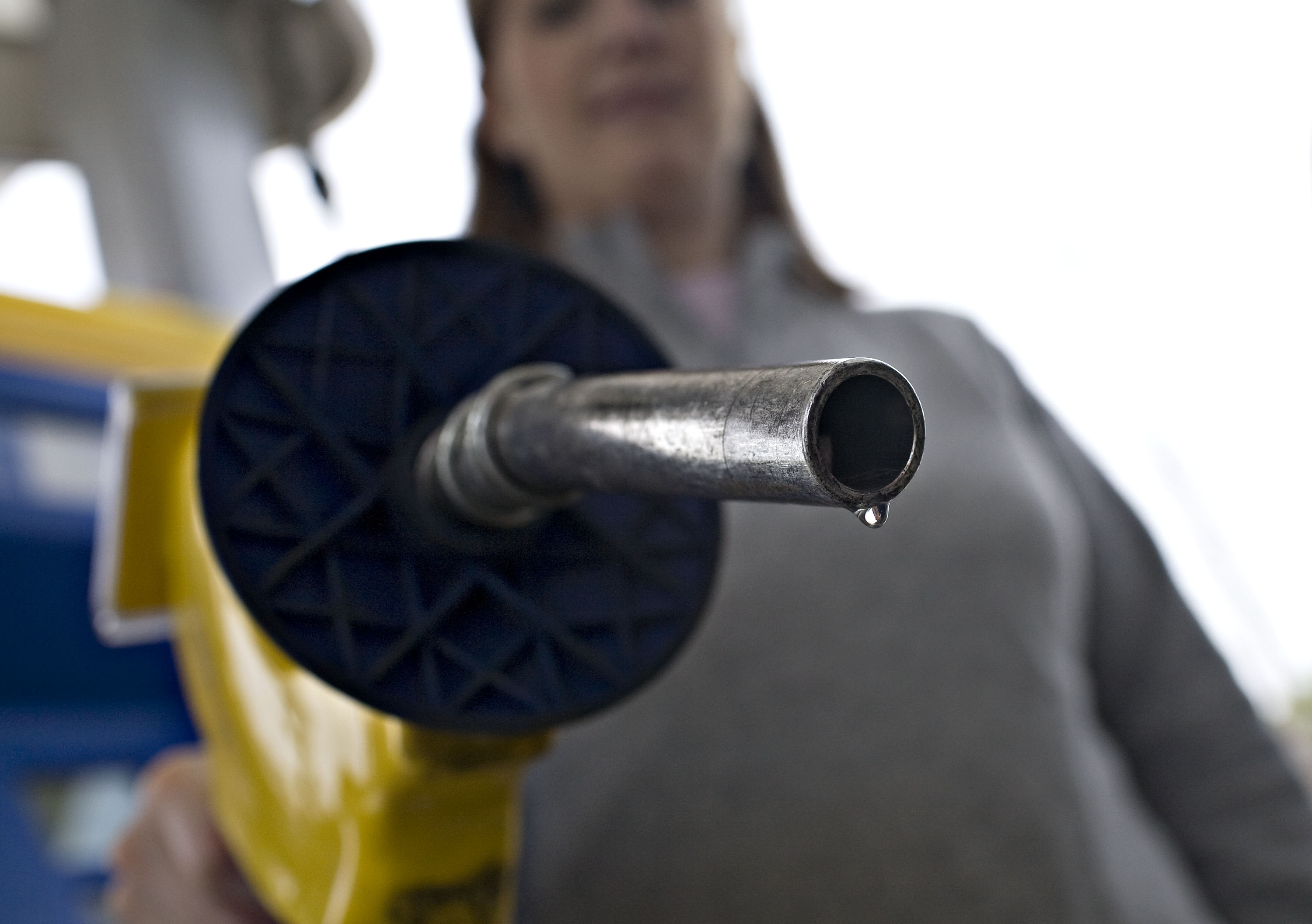 A drop of E85 hangs at the end of a gas pump in Birmingham, Michigan.