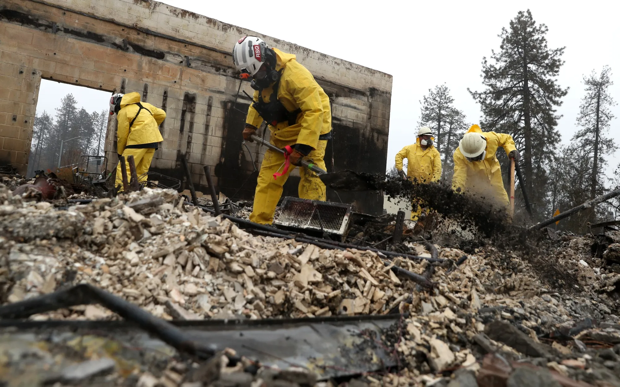 Search and rescue crews dig for human remains in Paradise, California on Nov. 21.