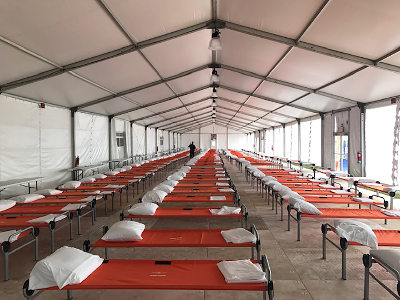 Migrants Sent to NYC Face Tent Triage Centers With Shelters Overflowing -  Bloomberg