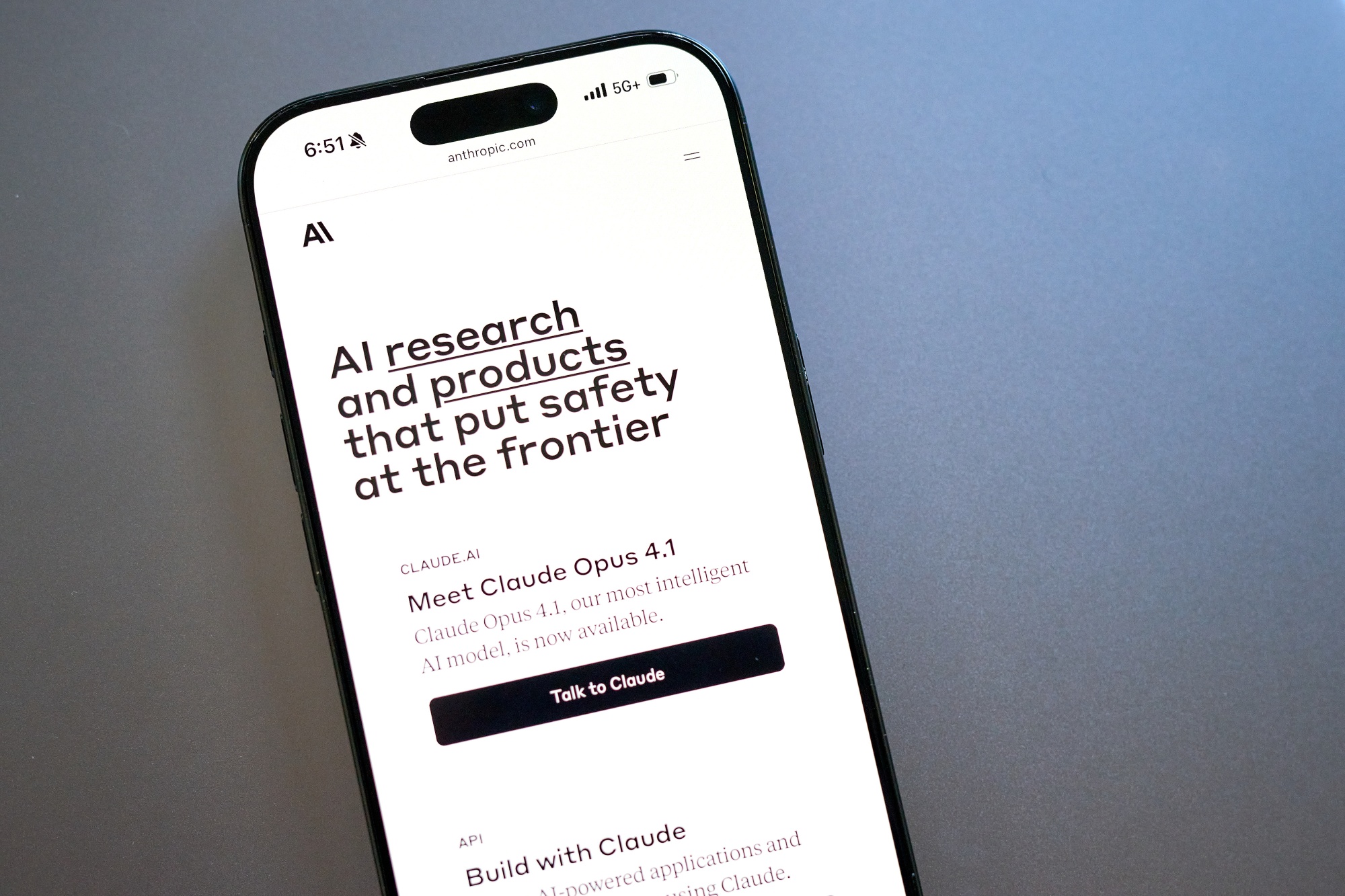 The Anthropic website on a smartphone arranged in New Hyde Park, New York, US, on Friday, Aug. 22, 2025. Anthropic is nearing a deal to raise as much as $10 billion in a new round of funding, according to people familiar with the matter, a higher than expected sum and one of the largest megarounds to date for an artificial intelligence startup.