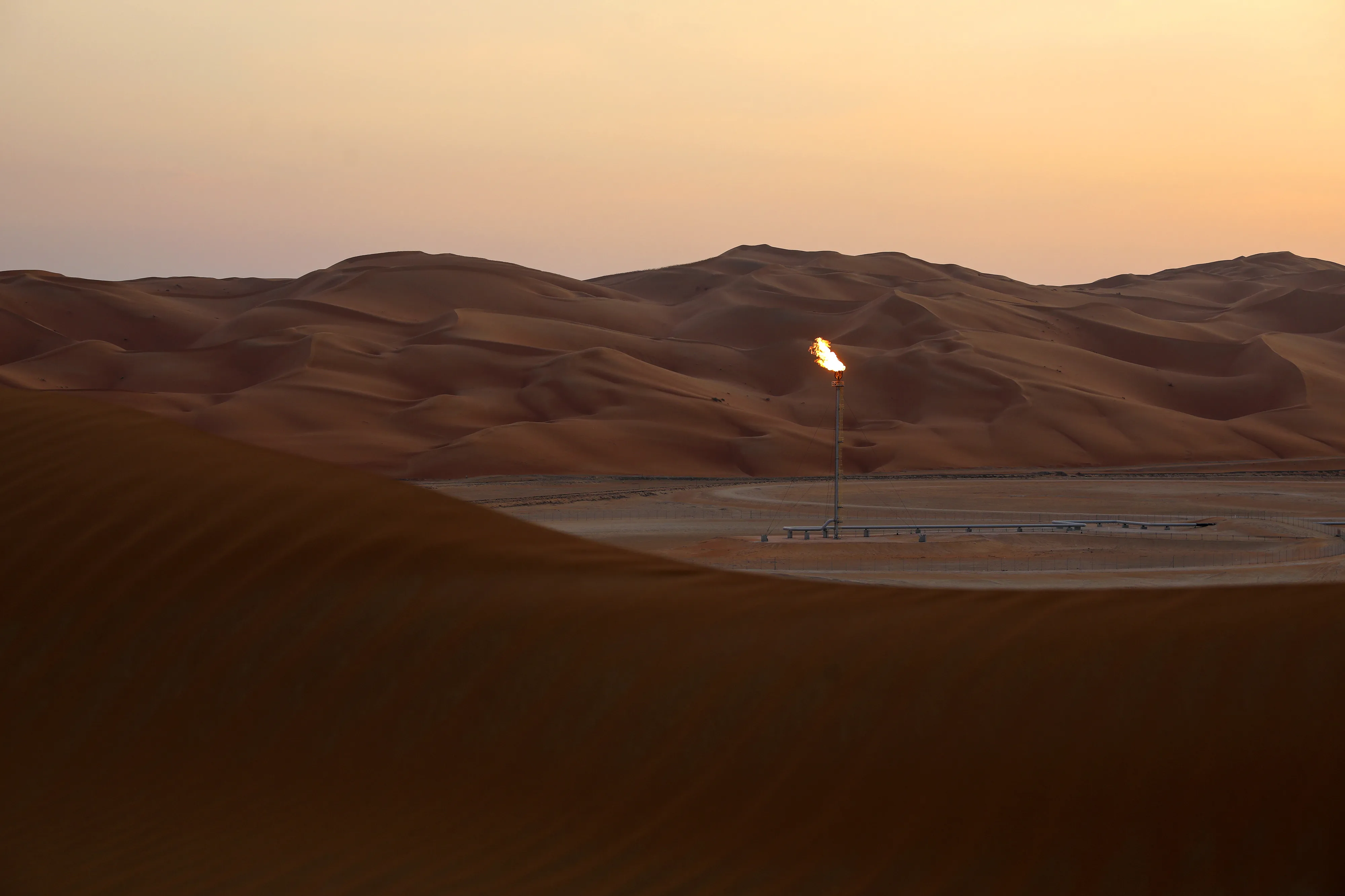 Flames burn off at an oil processing facility in Shaybah, Saudi Arabia.