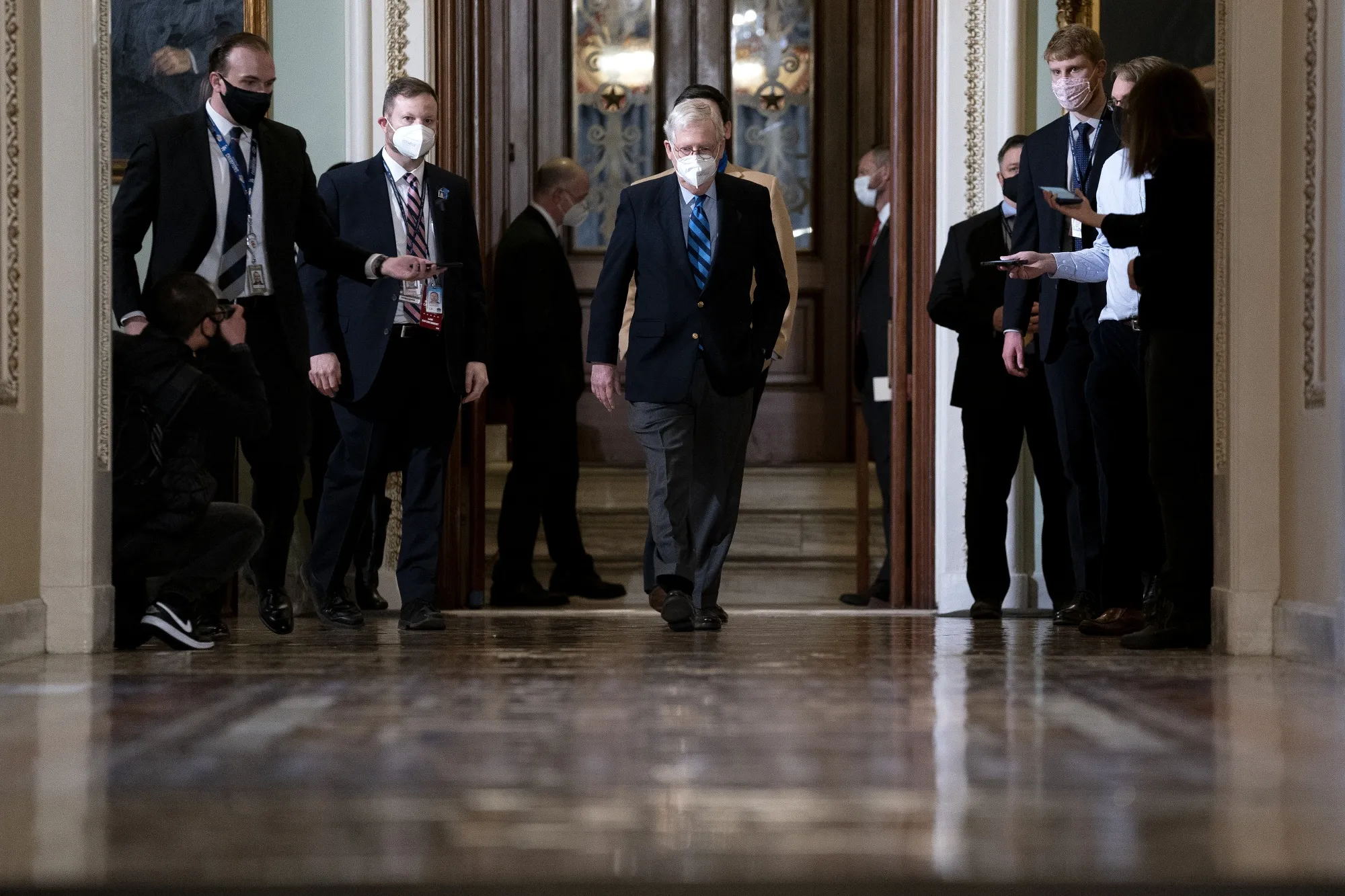 Senate Majority Leader Mitch McConnell, center