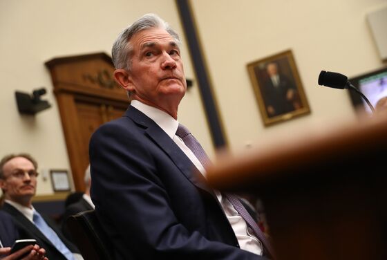 Powell Concession on Too-Tight Fed Underlines Shift Toward Cuts