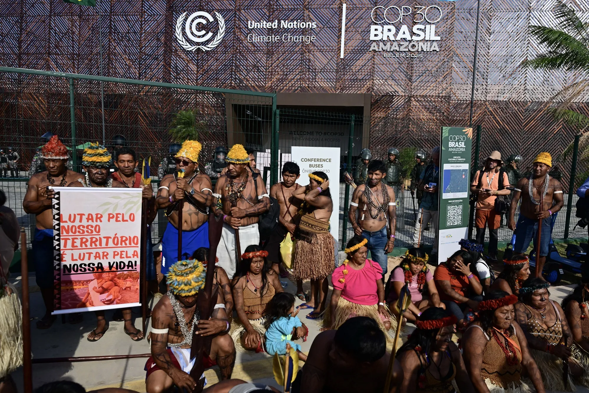 People from Brazil’s Indigenous Munduruku group outside the COP30 venue&nbsp;in Belem&nbsp;on Nov. 14.
