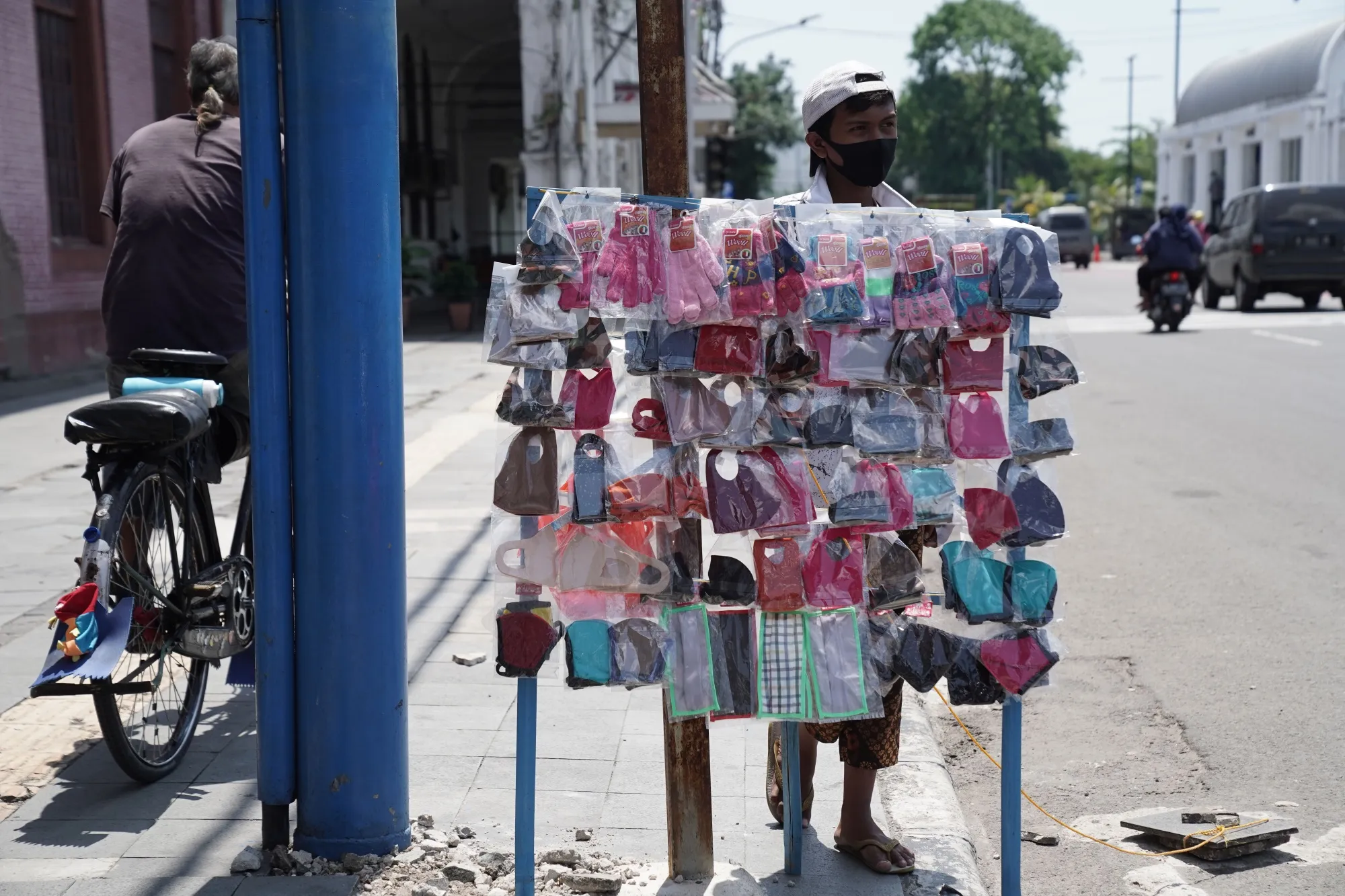A street vendor sells protective masks in Jakarta.