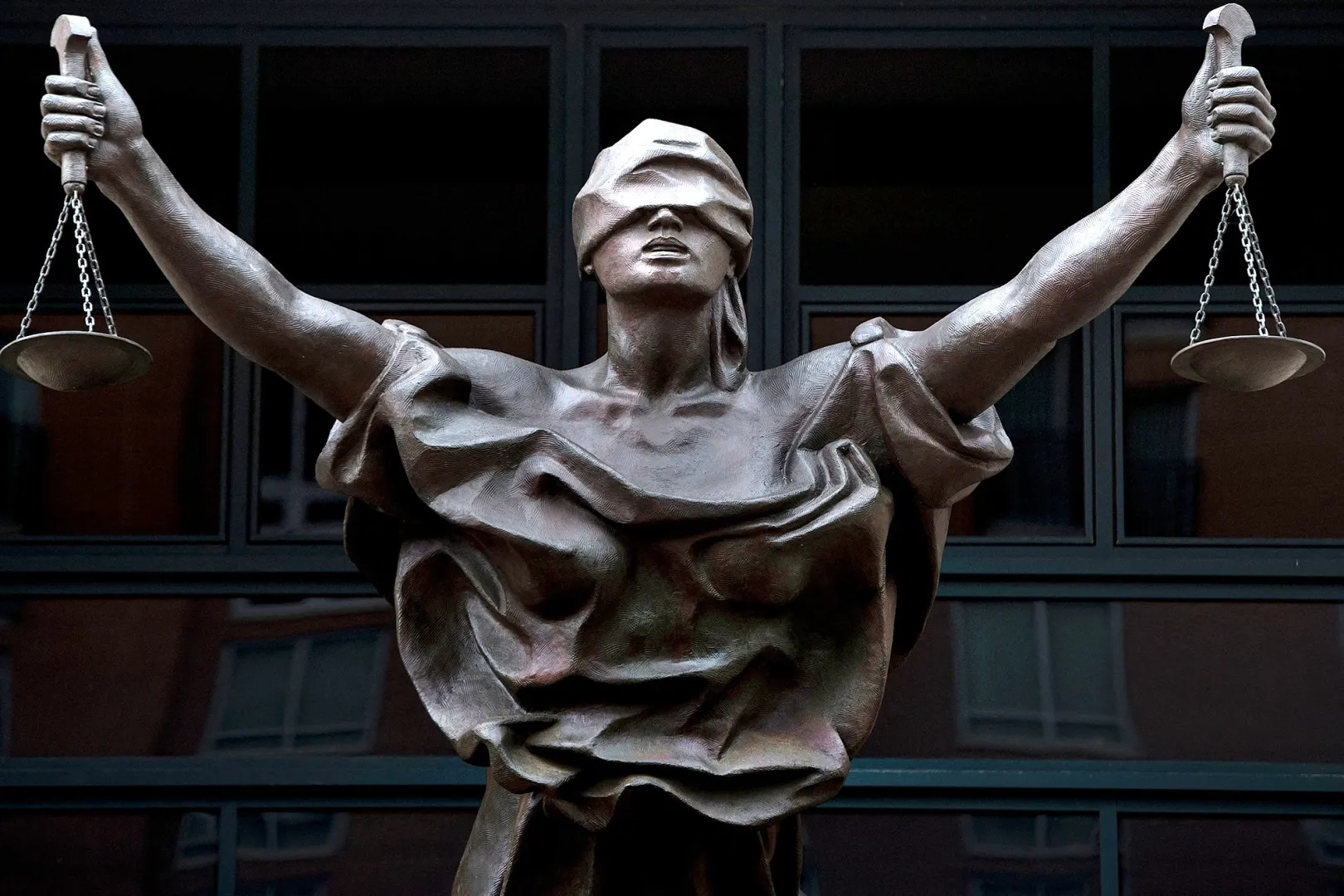 A statue of Justice outside the Albert V. Bryan US federal courthouse in Alexandria, Virginia.