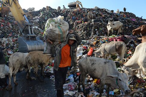 A garbage disposal area in Makassar, Indonesia's South Sulawesi province. Photographer: Dimas Ardian/Bloomberg