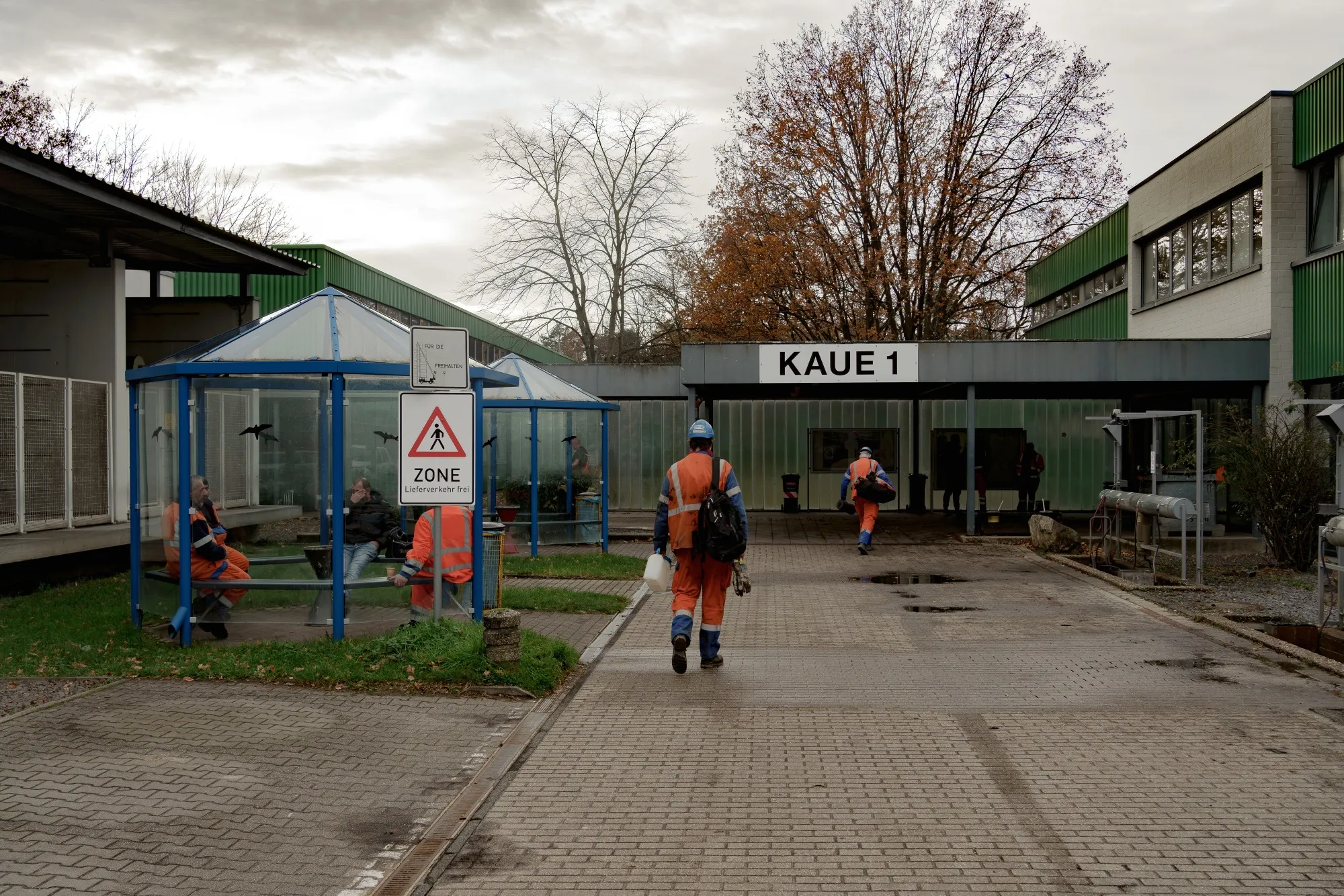 Workers outside changing facilities at&nbsp;RWE AG’s Hambach lignite mine in Niederzier, Germany, on Nov. 27.