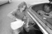 Motorist Pours Gas Into Car From Jug During 'Oil Crisis'