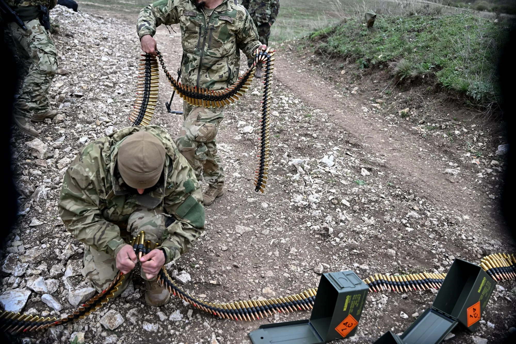 Hungarian soldiers hold cartridges near a tactical vehicle at a military training center near Veszprem, Hungary.