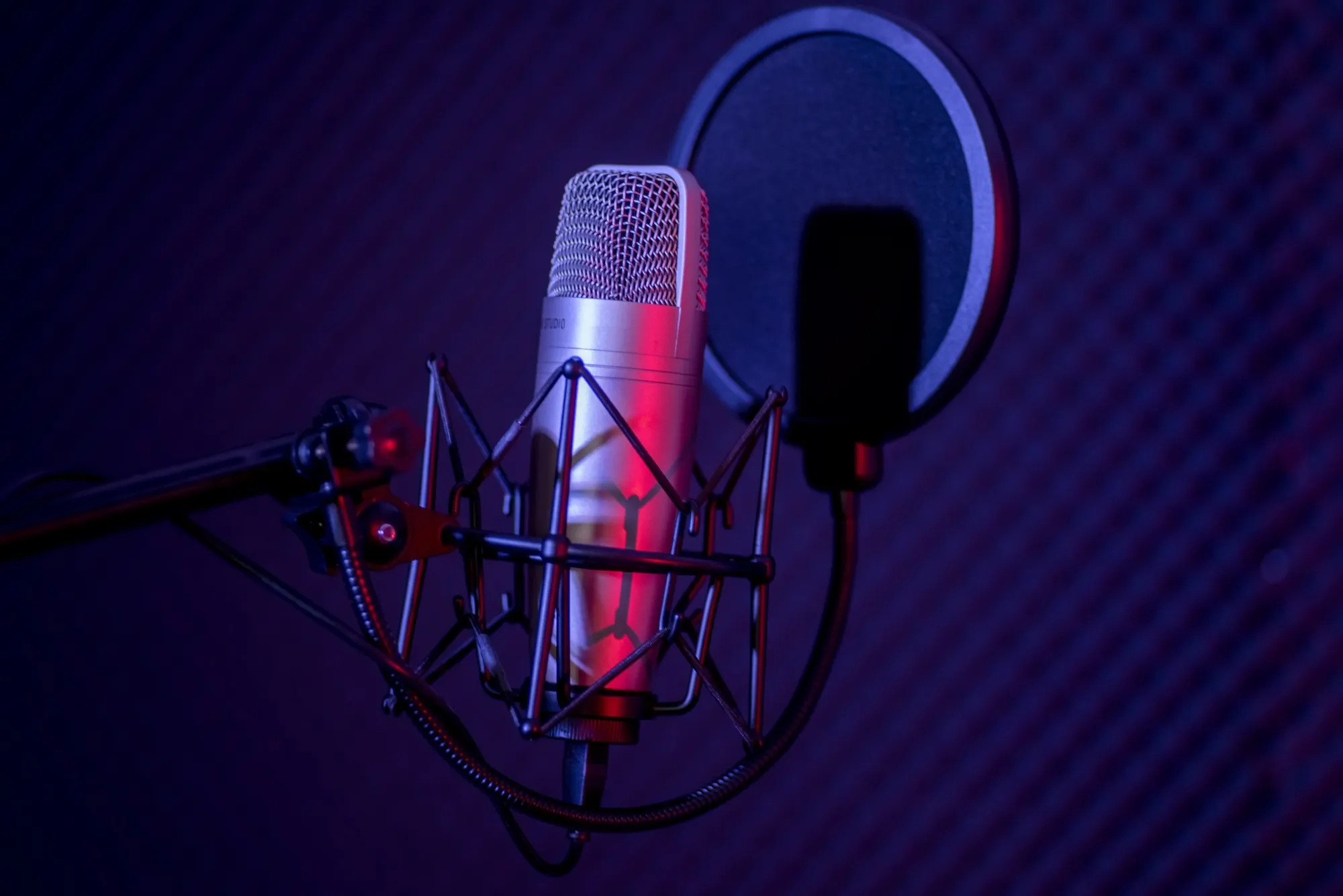 Microphone in radio station broadcasting studio.