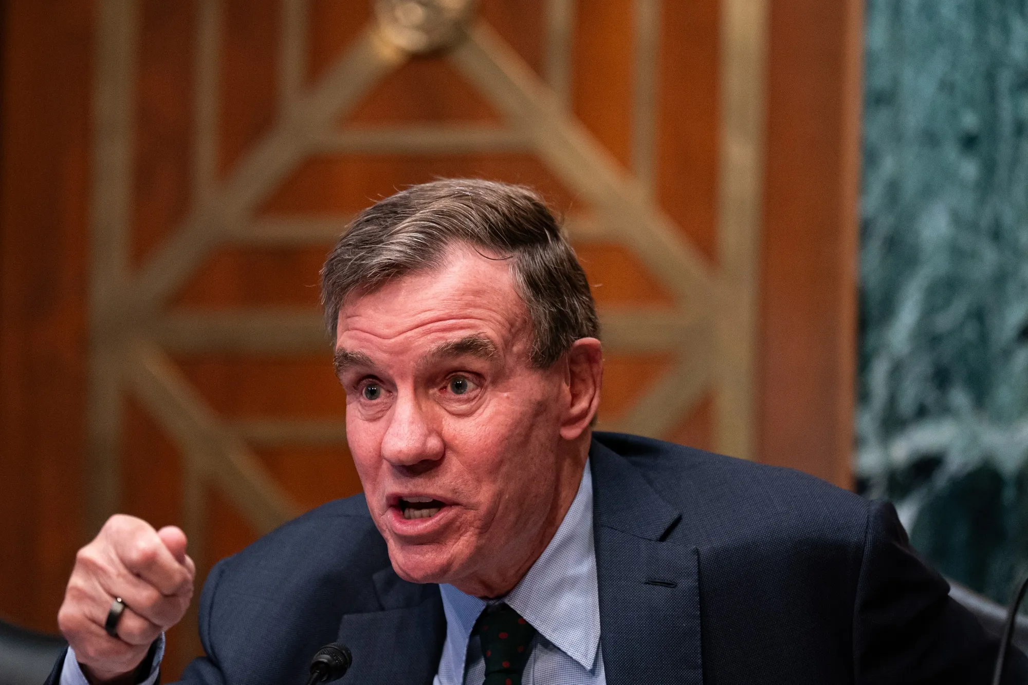 Senator Warner warns Wall Street against paid early access to Trump posts