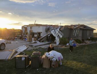 relates to Residents begin going through the rubble after tornadoes hammer parts of Nebraska and Iowa