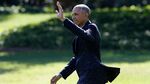 President Barack Obama waves as he walks on the South Lawn of the White House in Washington on Oct. 11, 2016.
