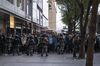 Riot police stand off against demonstrators during a protest in the Central district of Hong Kong, China, on Sunday, Jan. 19, 2020. Two Hong Kong police officers were beaten at a rally in the city center that was dispersed as it descended into confusion and violent clashes.