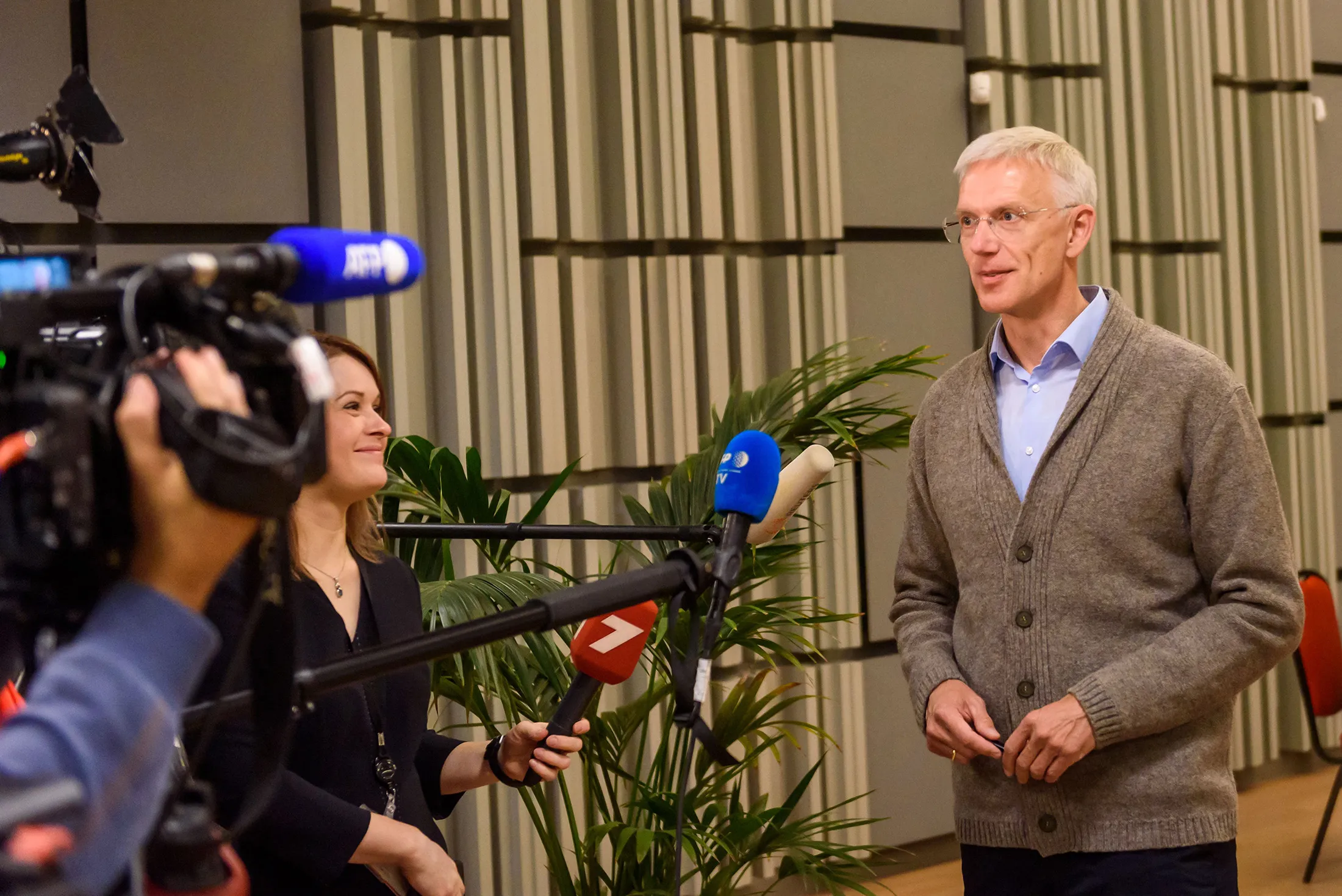 Krisjanis Karins speaks to media after casting his ballot during the general election in Sigulda, Latvia, on Oct.&nbsp;1.