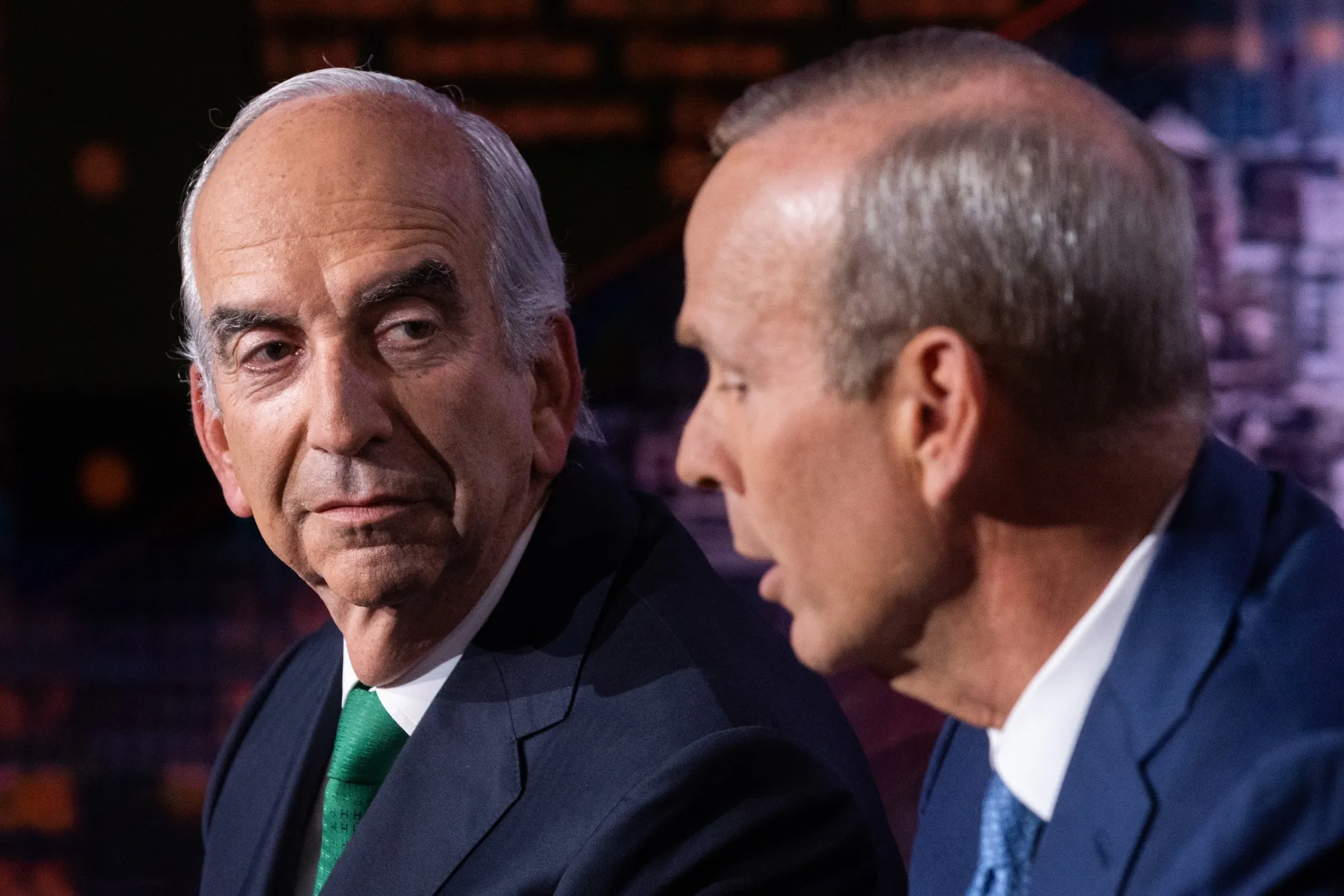 John Hess, chief executive officer of Hess Corp., left, and Mike Wirth, chairman and chief executive officer of Chevron Corp.