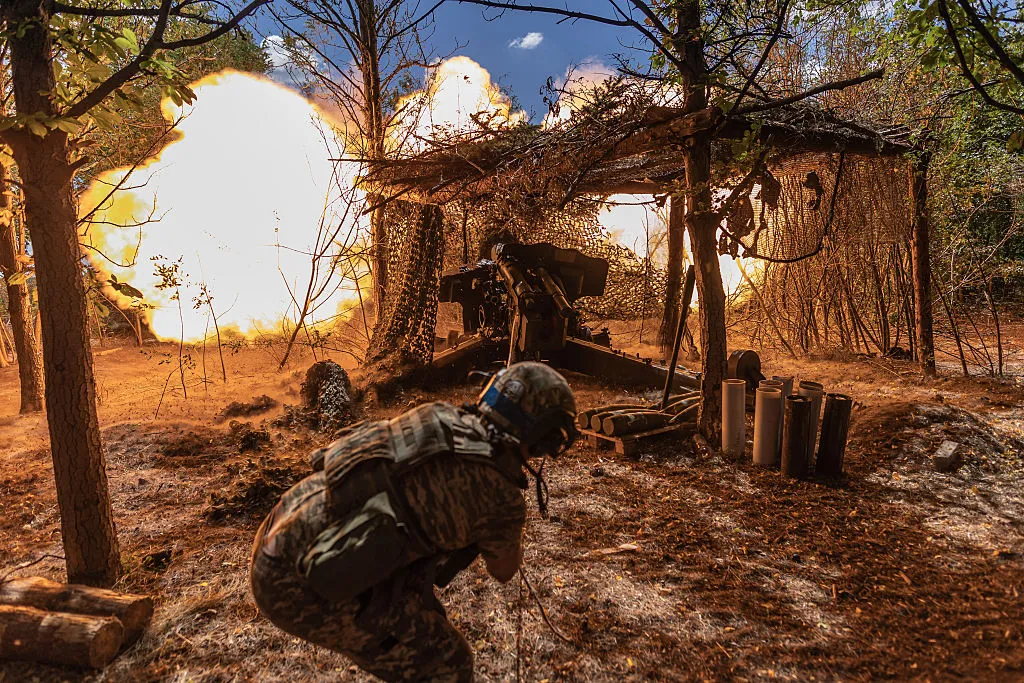 Ukrainian territorial defense soldiers&nbsp;fire a D-20 artillery in the direction of Toretsk,&nbsp;Ukraine, on July 24.
