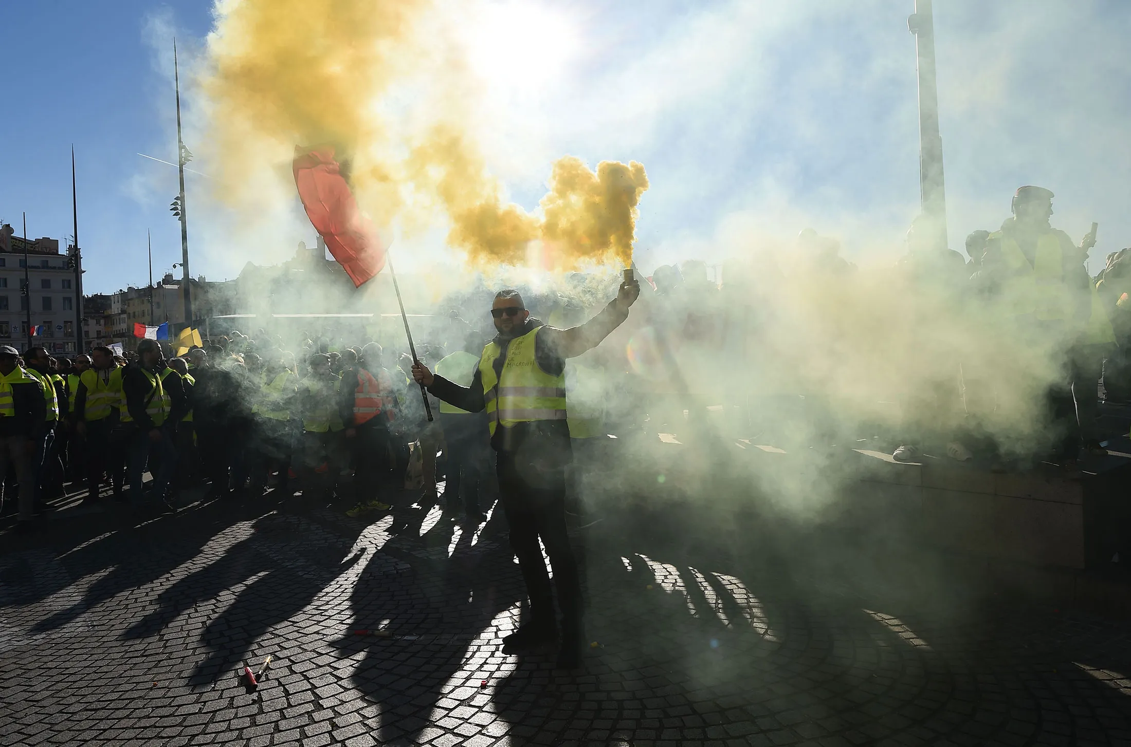 A protester lights a flare during&nbsp;demonstrations on Jan.&nbsp;12.