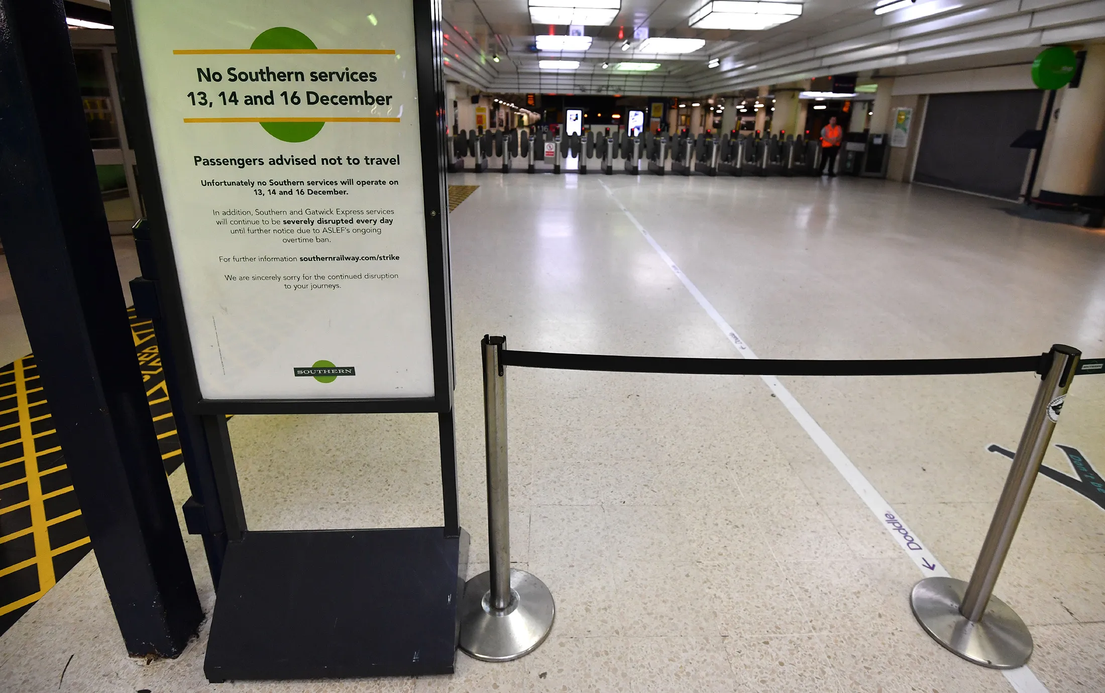 A sign by Southern Rail tells passengers of strike action at Victoria station in London, on Dec. 3, 2016. Hundreds of thousands of British commuters faced travel chaos today as train drivers went on strike in what is expected to be the worst rail disruption in decades. Southern Rail, which runs trains between England's south coast and London, warned of severe disruption as it cancelled all of its 2,284 services after workers launched three days of industrial action. / AFP / Ben STANSALL (Photo credit should read BEN STANSALL/AFP/Getty Images)
