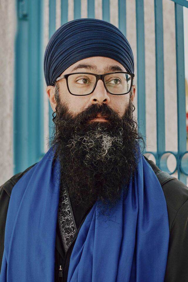 Head and shoulders portrait of Moninder Singh.