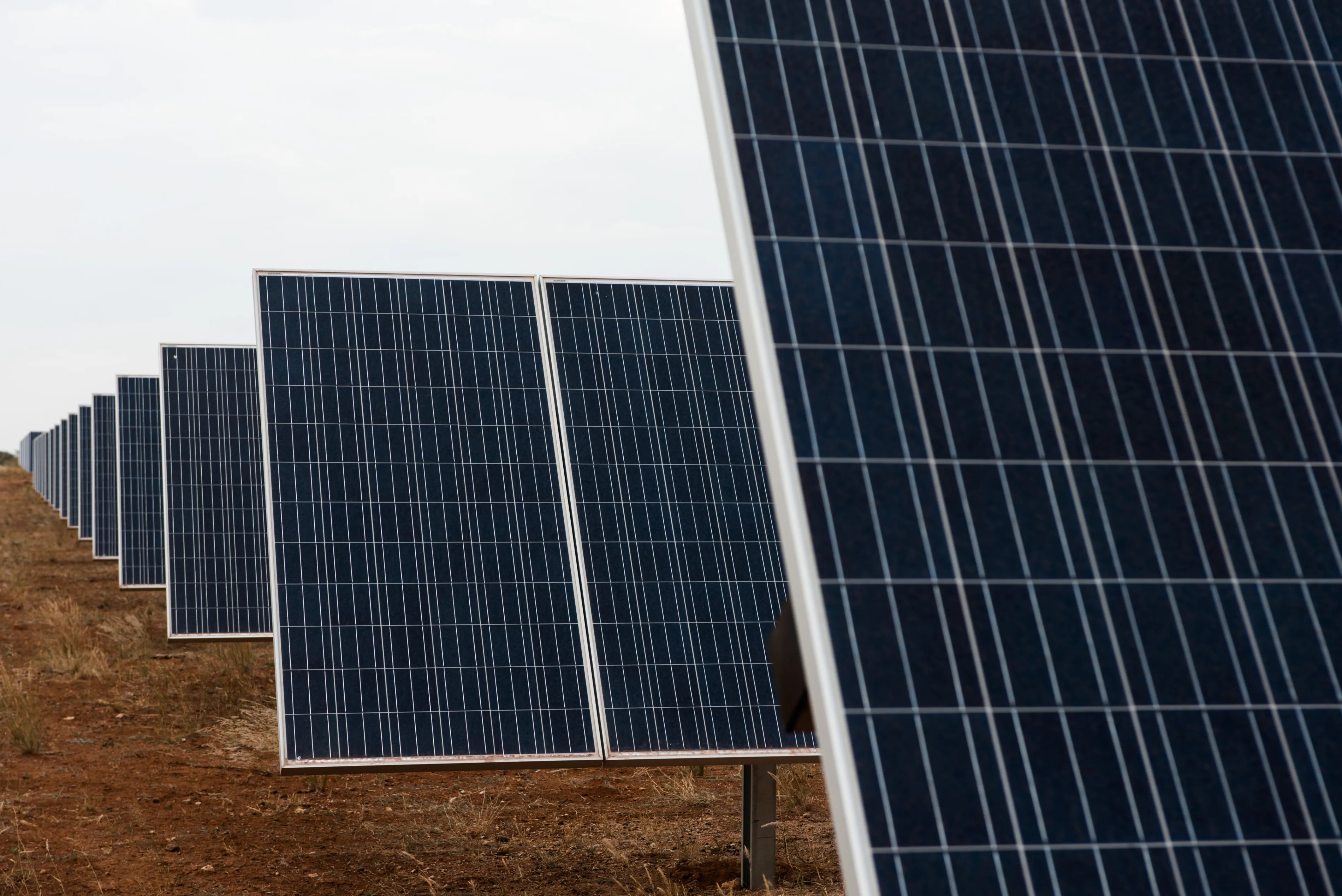 Photovoltaic panels stand in the Sishen solar park, operated by Acciona SA, in Kathu, Northern Cape, South Africa.