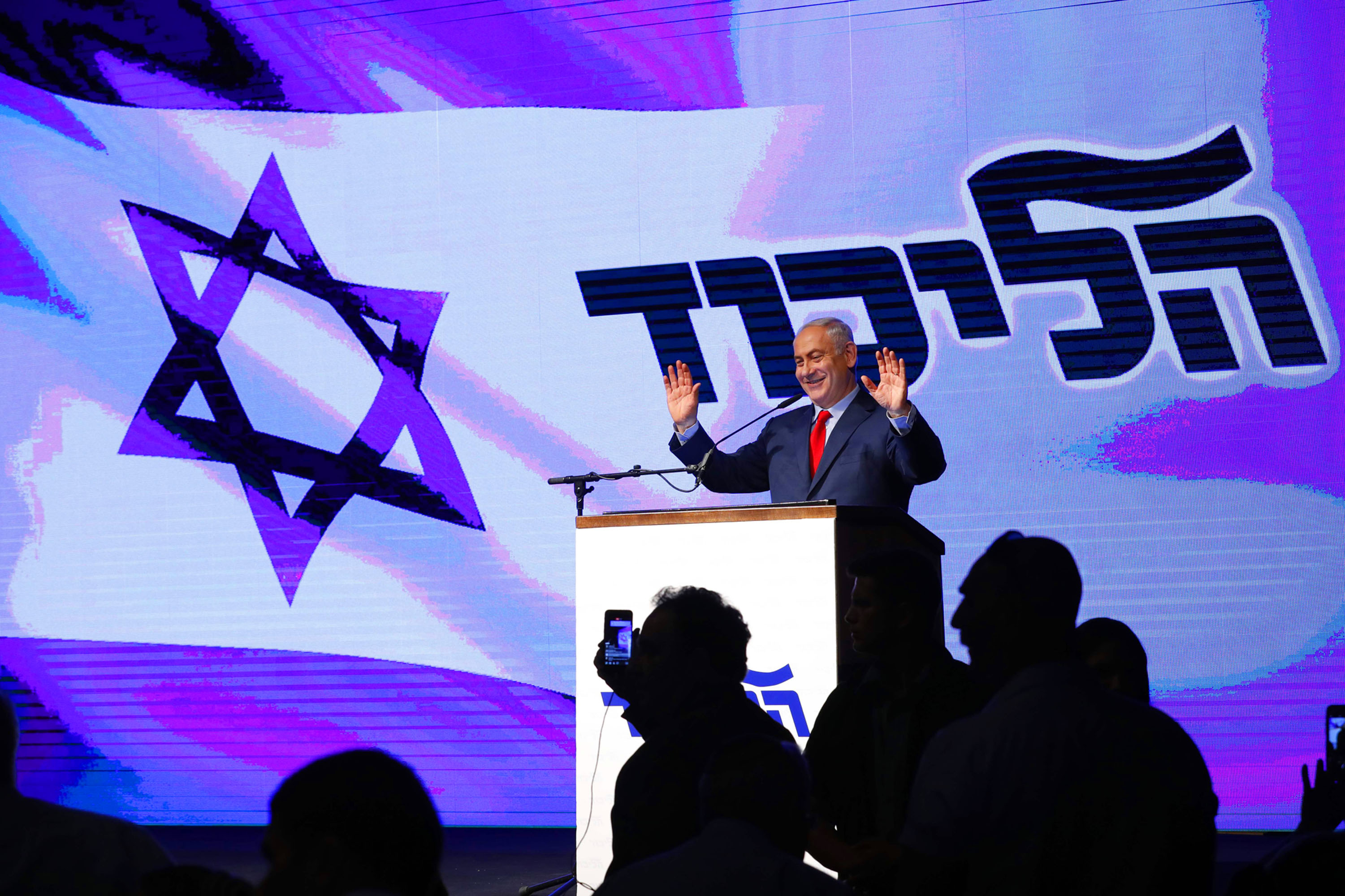 Benjamin Netanyahu delivers a speech during a gathering by Likud party members.
