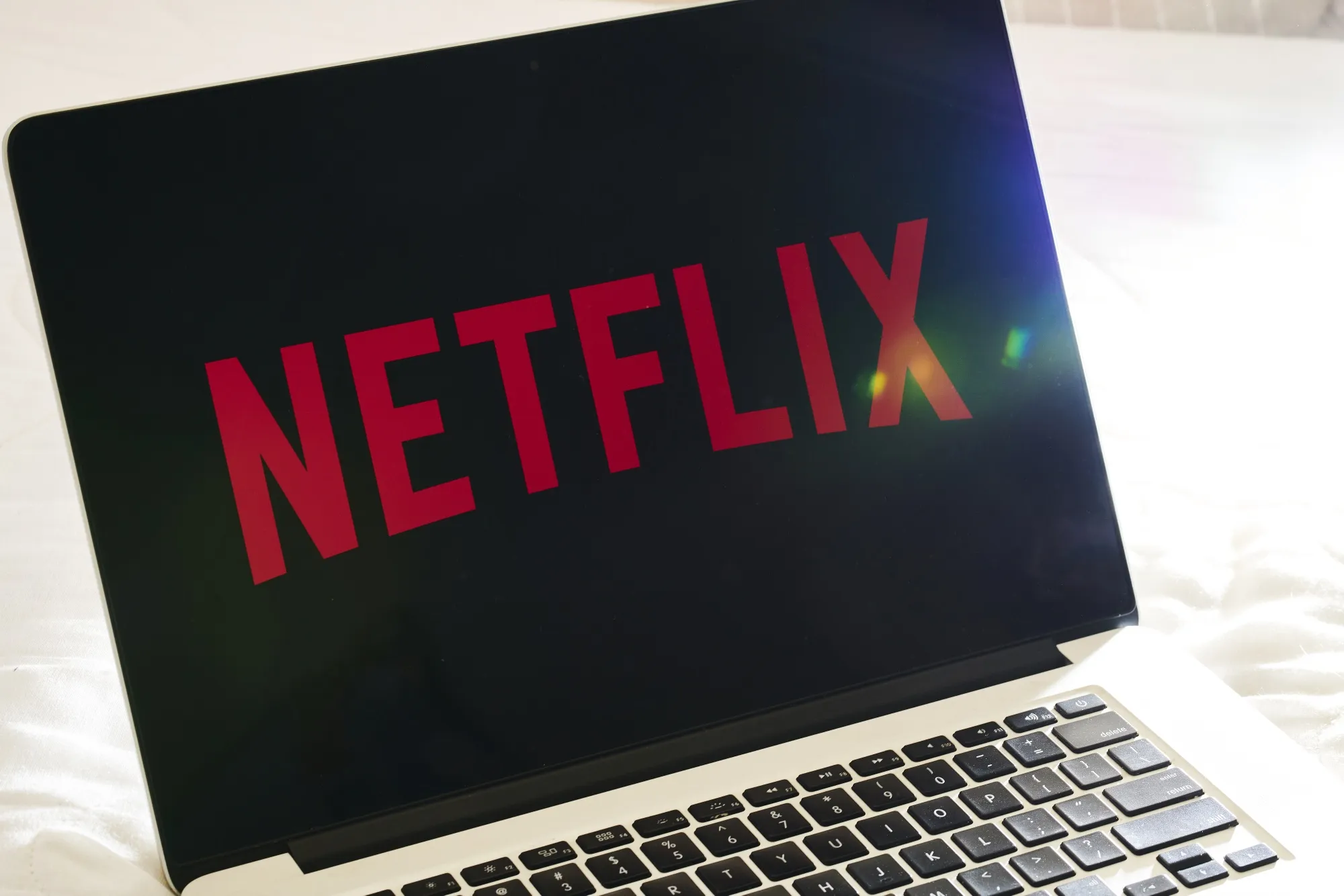 Netflix signage is on a laptop computer.