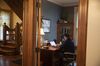 A person works from home on a laptop computer.