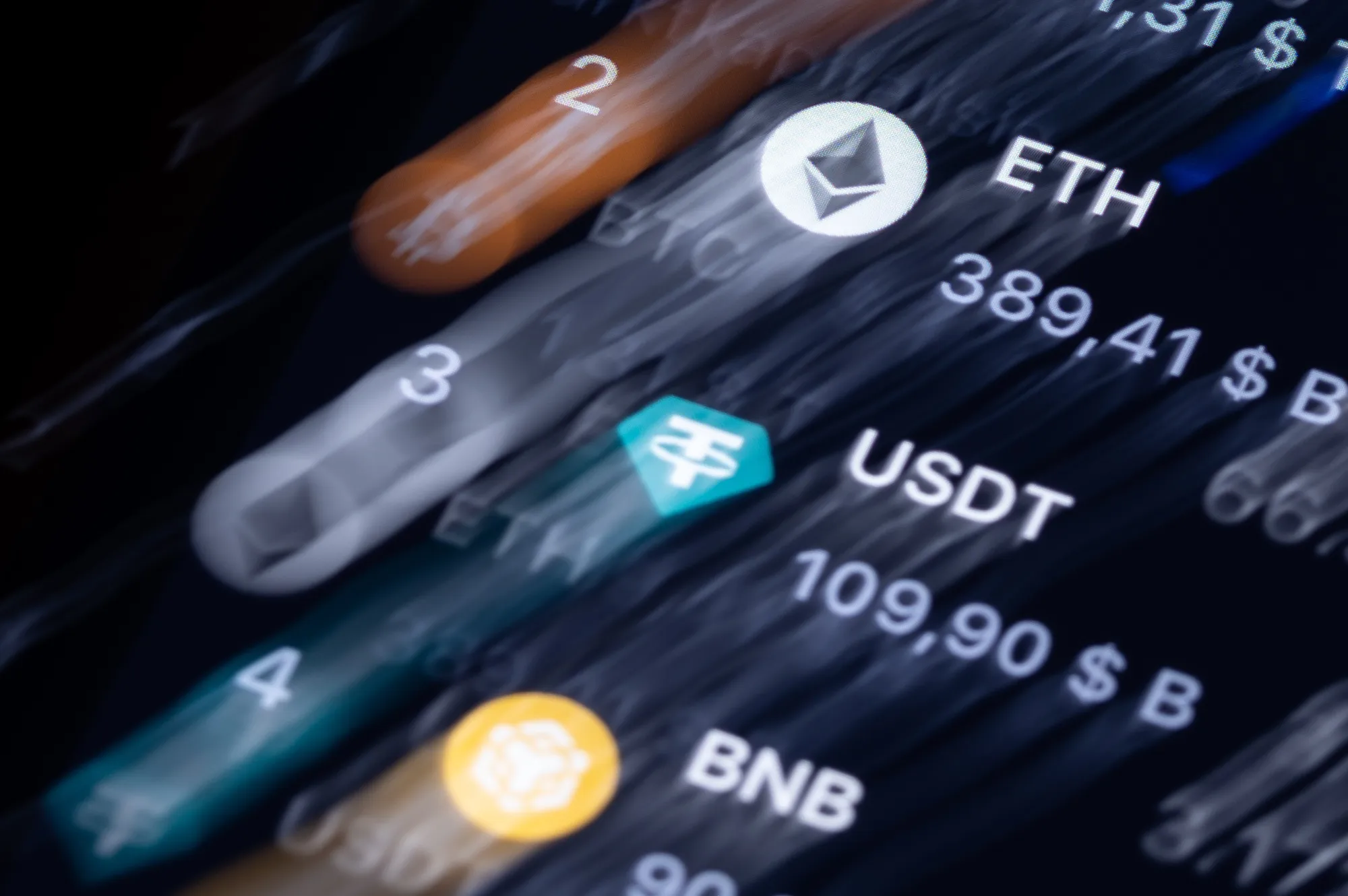 The logos of&nbsp;Ethereum,&nbsp;Tether, and&nbsp;Binance displayed&nbsp;on a&nbsp;trading platform.