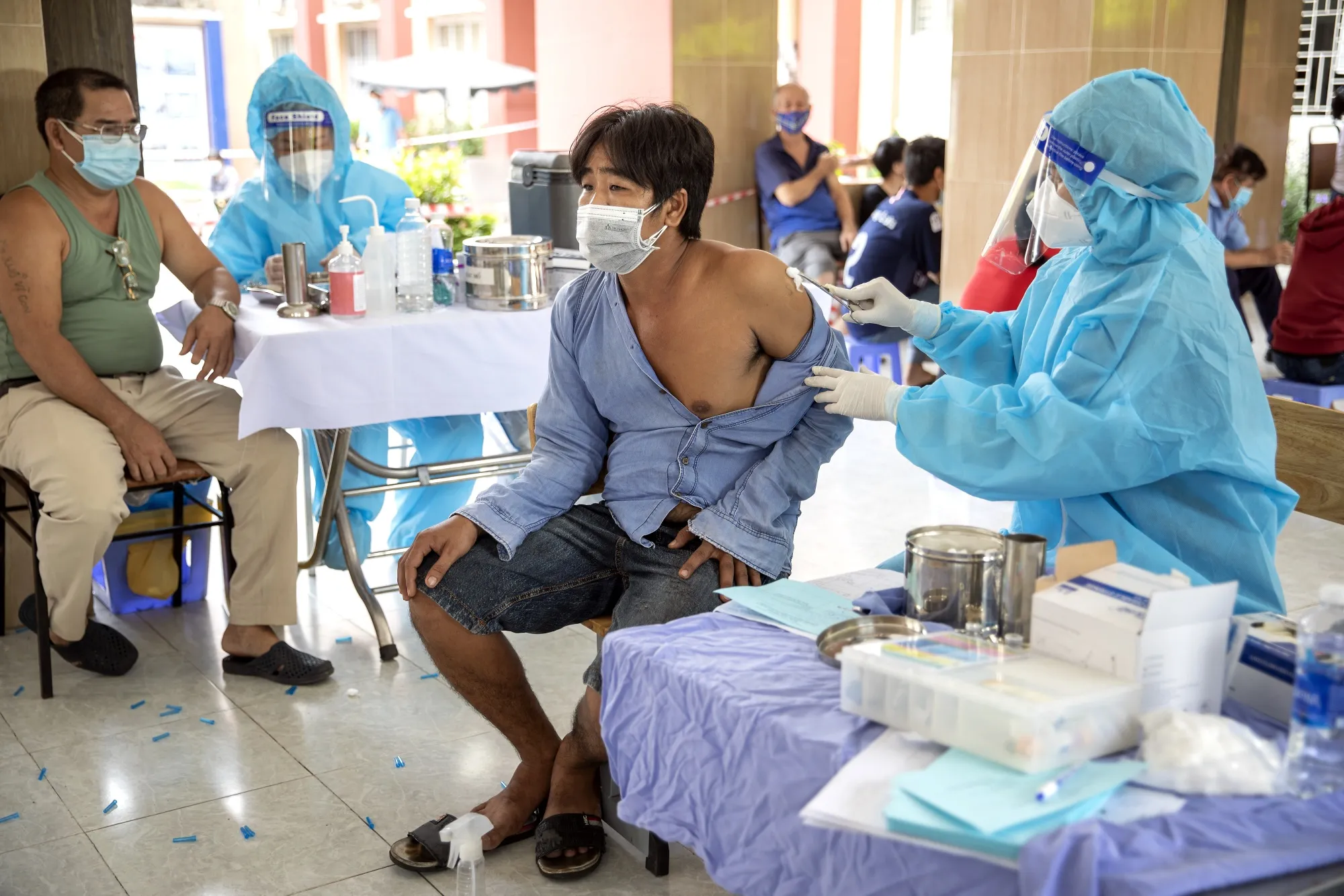 A member of the public receives a dose of a Covid-19 vaccine at a vaccination center in Ho Chi Minh City, Vietnam, on Aug. 5.