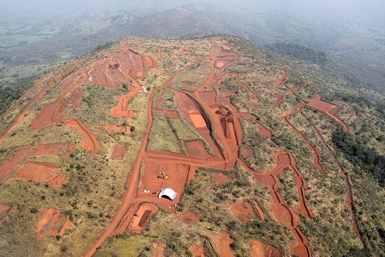 Mining Billionaire Ends Bitter Guinea Dispute After Months of Secret Negotiations