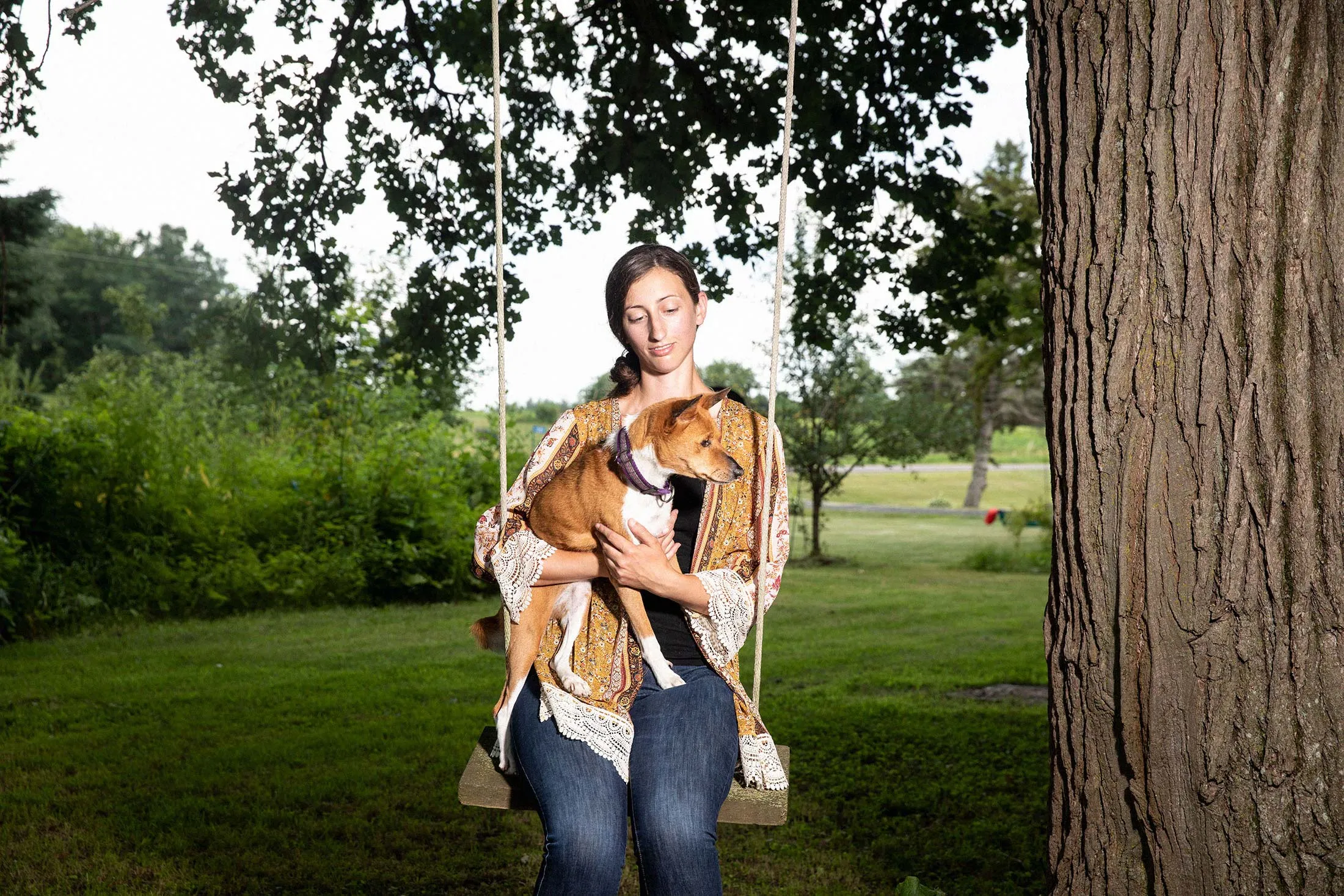 Dog trainer Kelsey Brown and her 16-year-old basenji named Dingo.