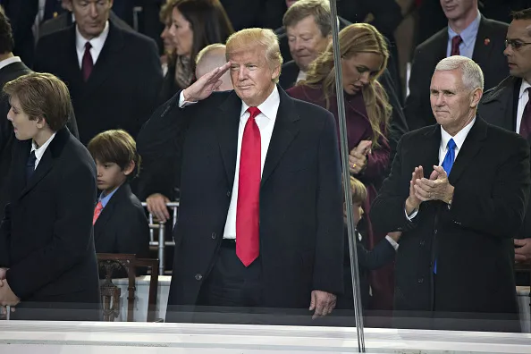 What's in his other hand?
