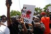TOPSHOT-SAFRICA-NIGERIA-DEMO-CRIME-POLICE