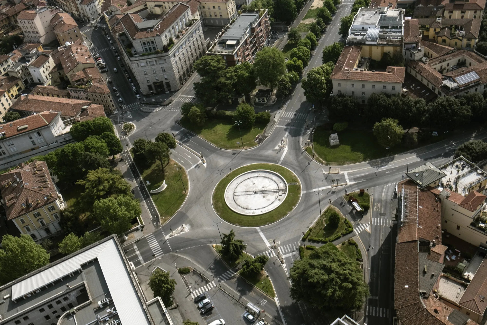 An intersection stands empty under lockdown, in Brescia, Italy.