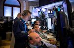 Traders work on the floor of the New York Stock Exchange (NYSE) in New York, U.S., on Tuesday, July 16, 2019.