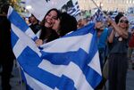 Supporters of the No vote celebrate after the first results of the referendum at Syntagma square in Athens, on July 5, 2015. Photographer: Petros Giannakouris/AP Photo
