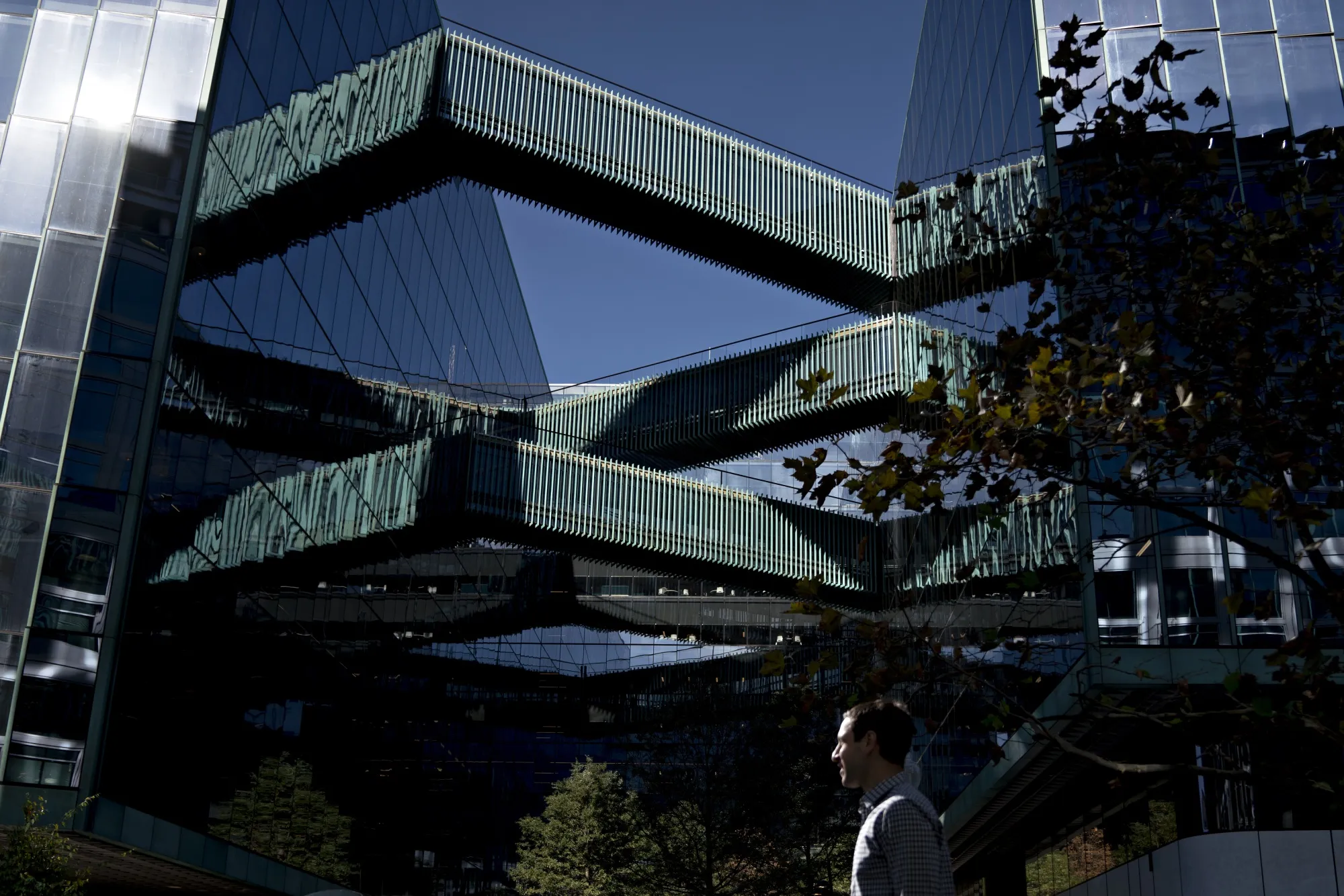 A pedestrian walks past the Federal National Mortgage Association (Fannie Mae) headquarters in Washington, D.C.