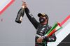 Lewis Hamilton celebrates on the podium after winning the Portuguese Formula One Grand Prix at the Autodromo Internacional do Algarve on Oct. 25.