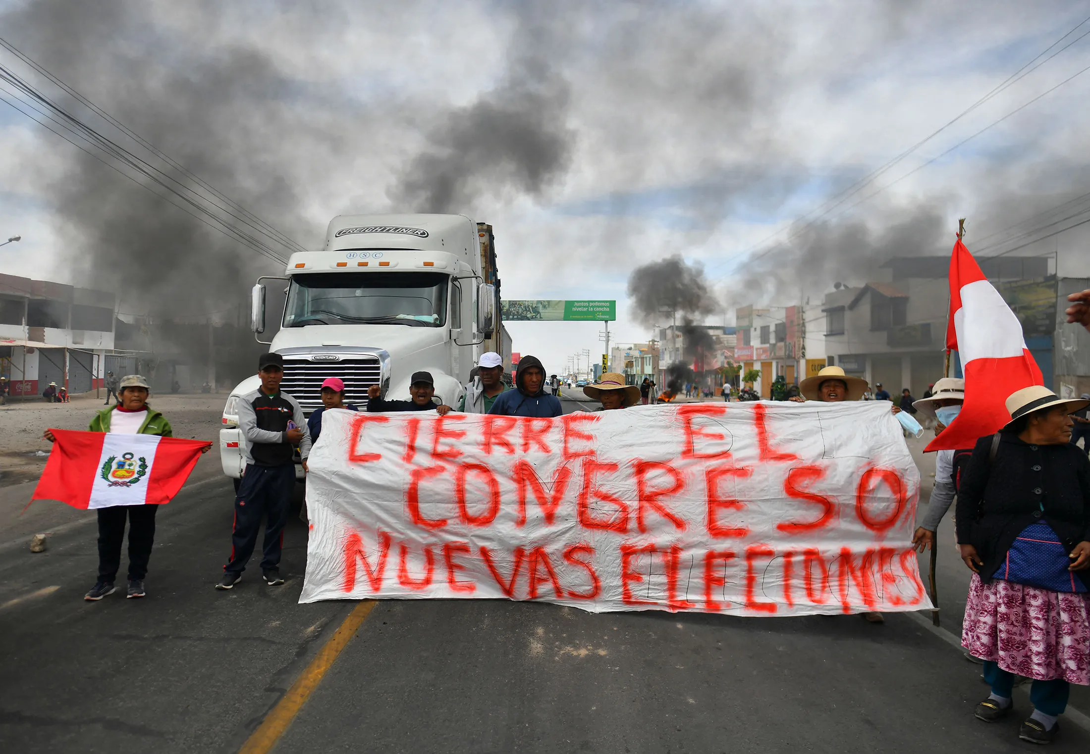 Supporters of former President Pedro Castillo block the PanAmerican Highway in the town of La Joya, 1,000 kilometers south of Lima,&nbsp;on Dec. 9.