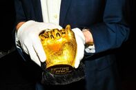 relates to The Strange Tale of Nelson Mandela’s Gold-Cast Hands